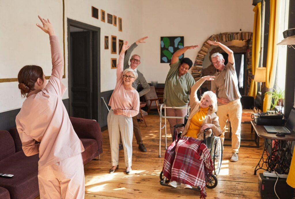 senior-people-stretching-in-retirement-home